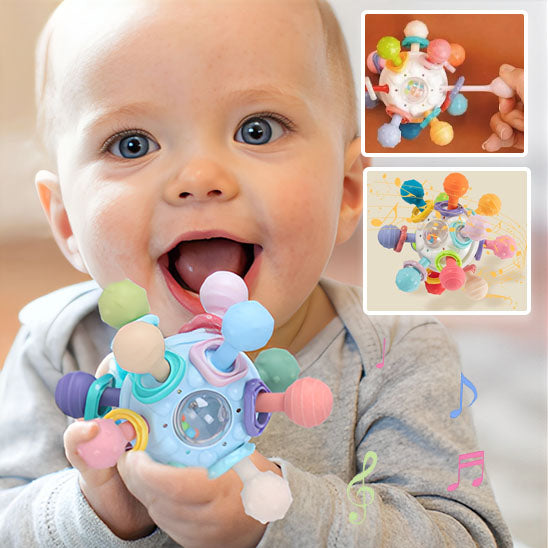hochet bebe sensoriel sourire